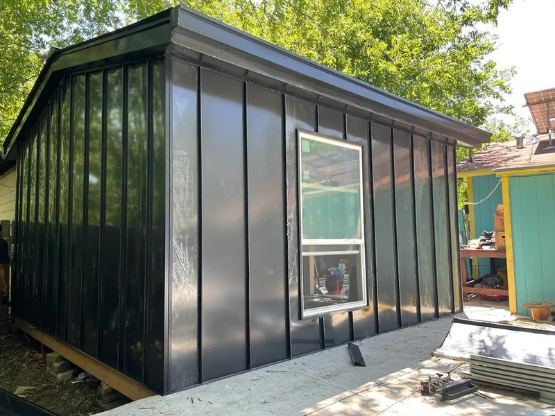 Black standing seam metal wall panels for Roof Inspection in Manchester